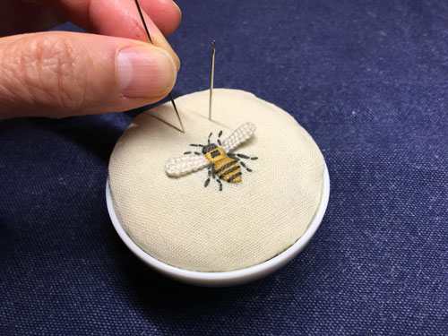 Embroidered emery pin cushion
