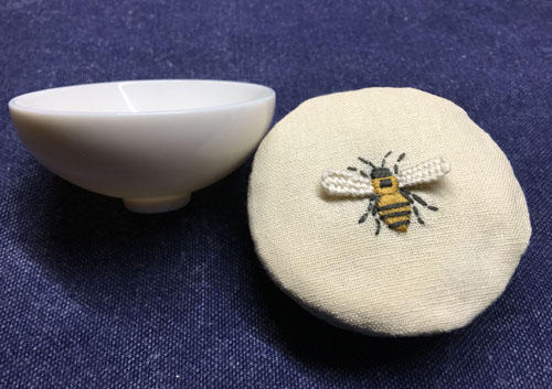 Embroidered emery pin cushion
