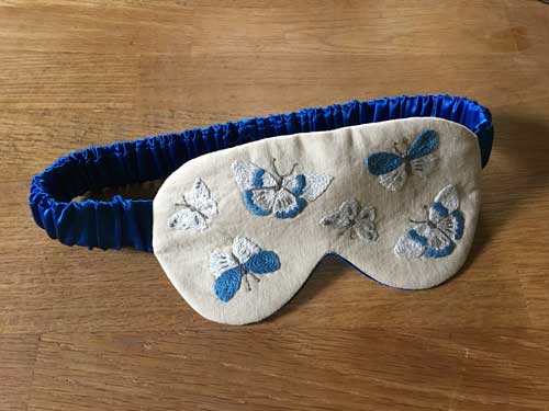 Embroidered sleep mask